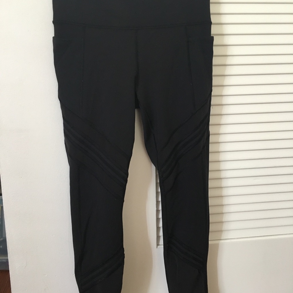 Athleta , black and mesh leggings, size small